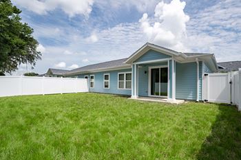 Private fenced-in expansive backyards
